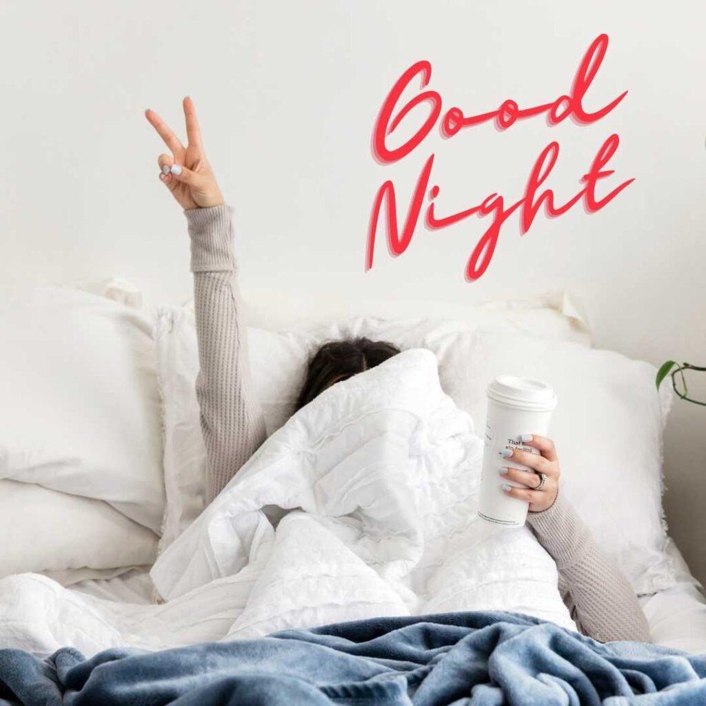 A girl sleeping with finger up and good night message