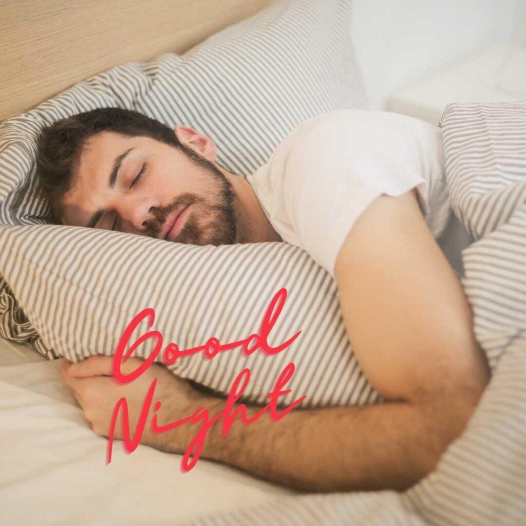 A man sleeping with good night message