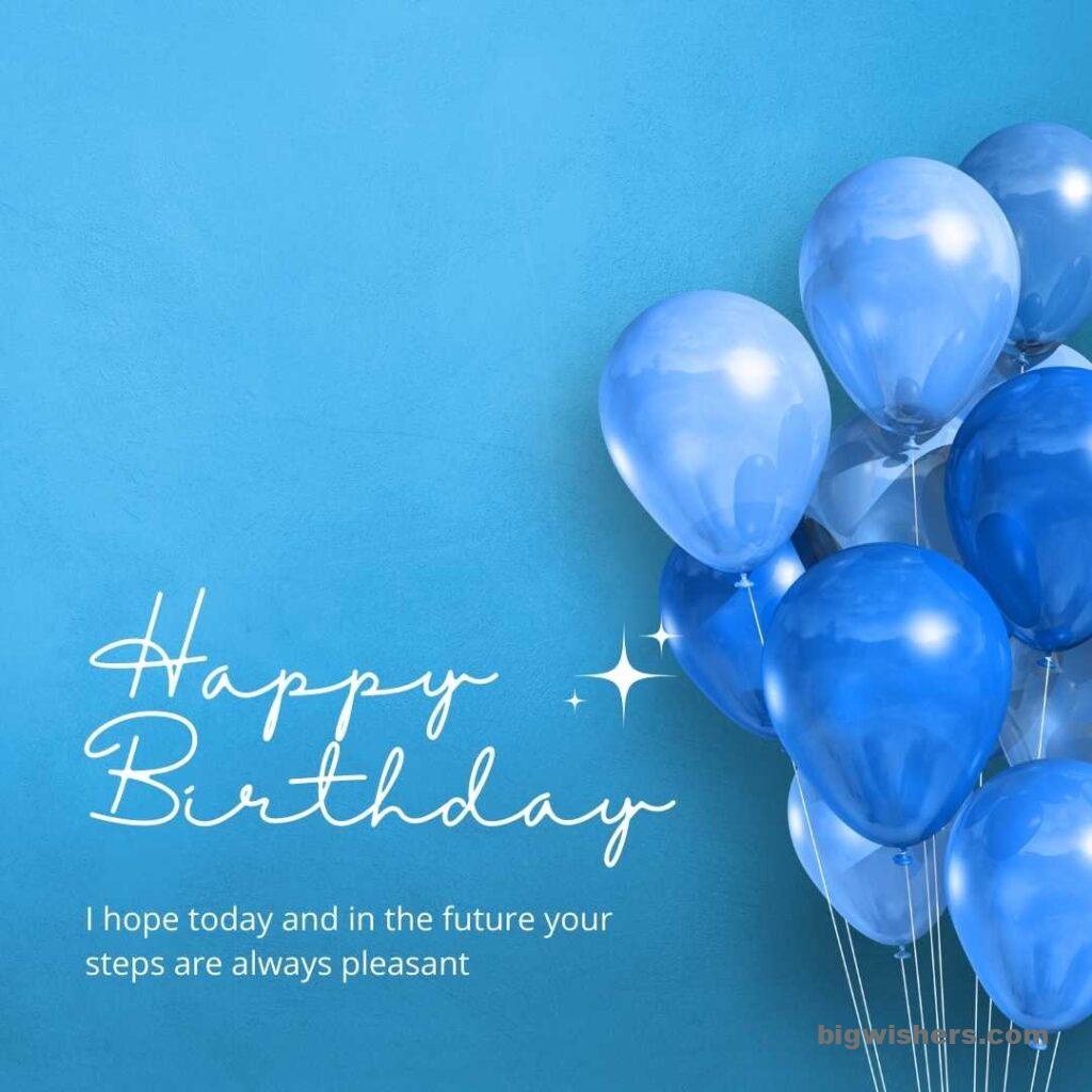 Blue balloon with written happy birthday