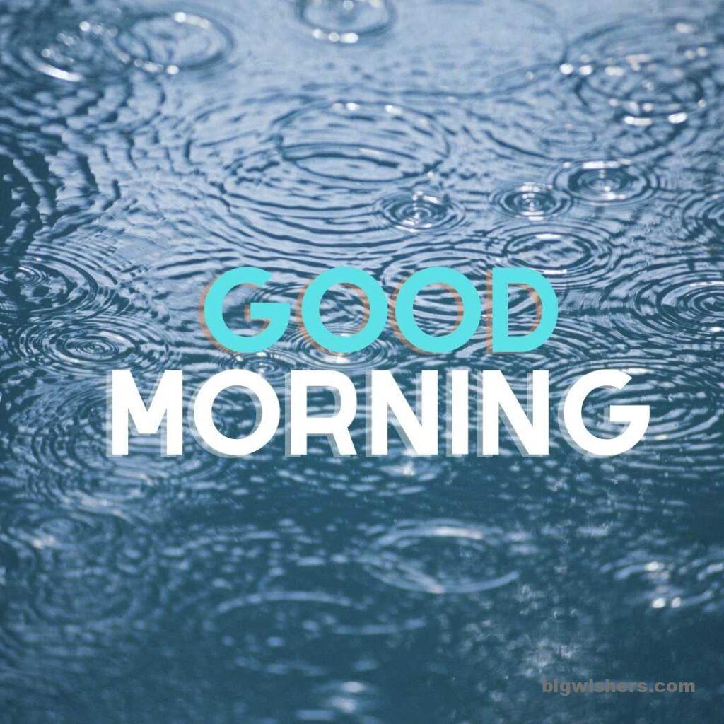 Rain drop on water with good morning message