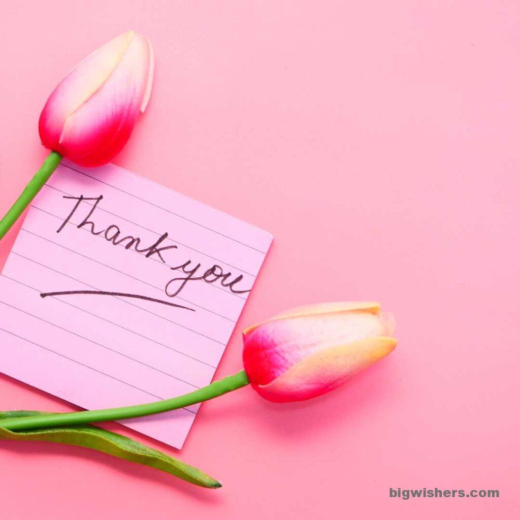 Pink paper with flower written thank you