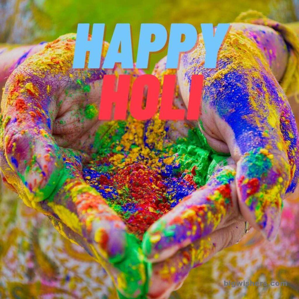 Colors are in hand written happy holi