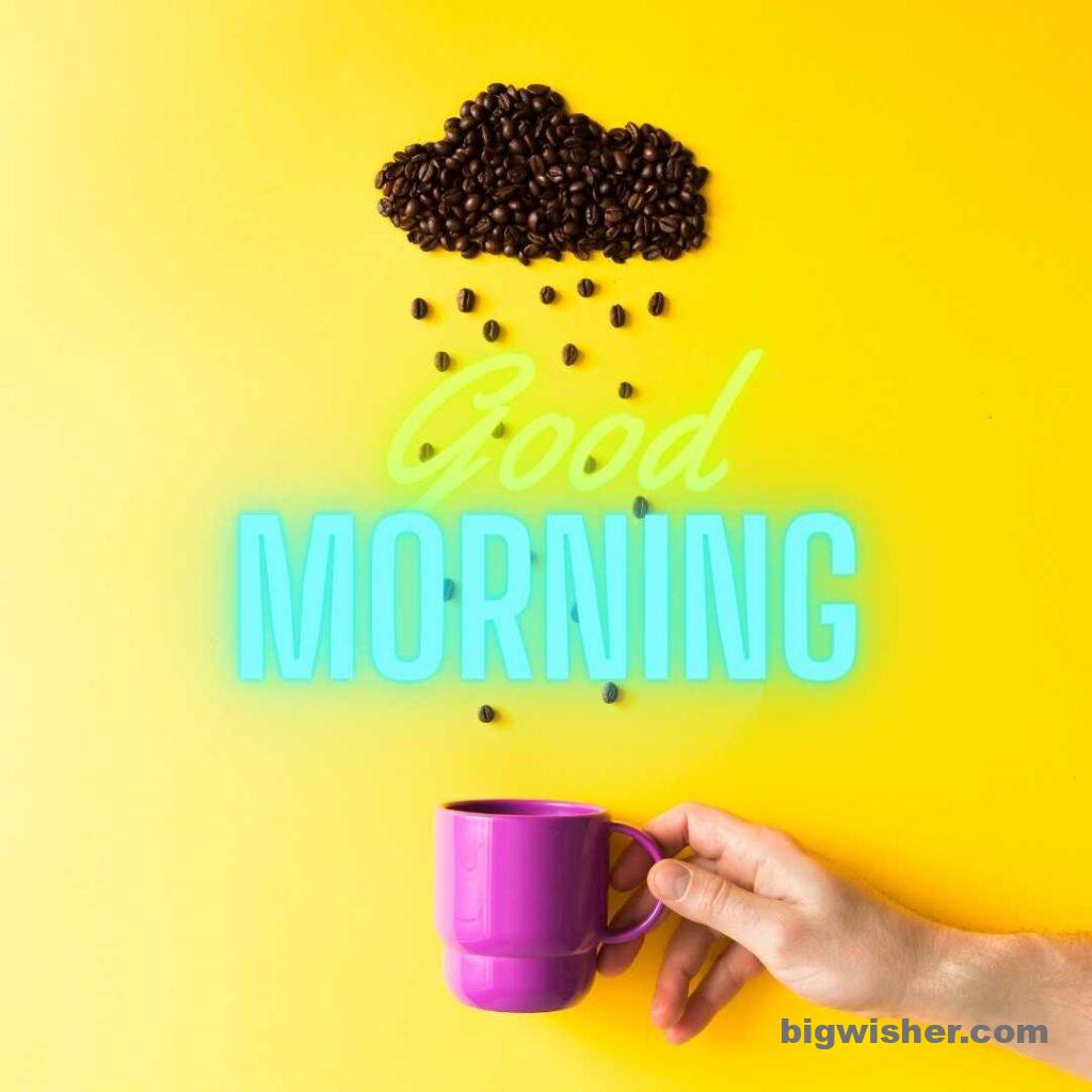 yellow background with representing rain with coffee bean collecting a pink cup written good morning